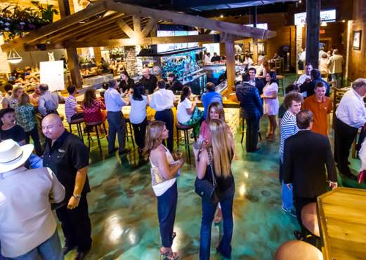 People socializing at the Backyard Music Hall
