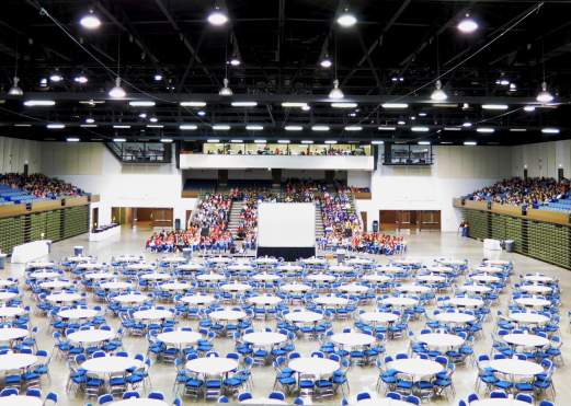 Beaumont Civic Center Stage With Rows Of Round Tables