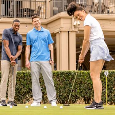 Group of young professionals putting