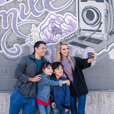 Family at Mural in the Rail District