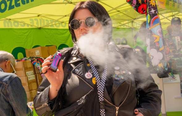 Woman smoking at Hash Bash