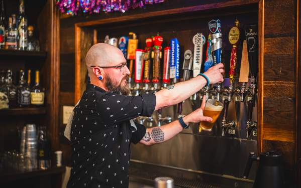 Beer being poured at Bourbon Barrel Tavern