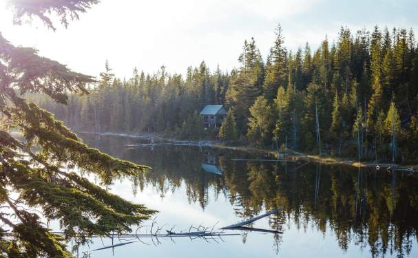 View of the lake and the Elk Lake Hut on the Sunshing Coast Trail.