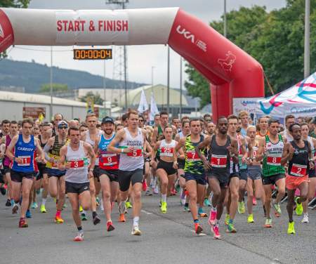 Entrants running off the starting line at the Swansea Bay 10k
