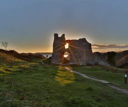 Sunlight pouring through castle ruin