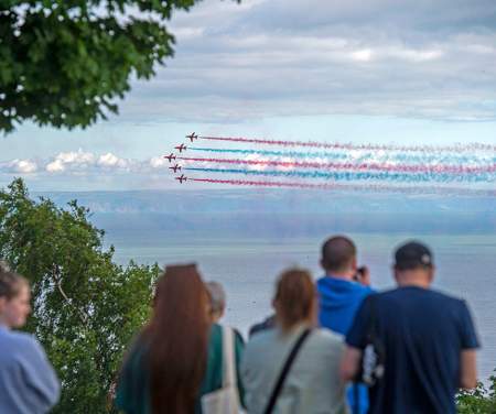 Red Arrows flying over Swansea Bay