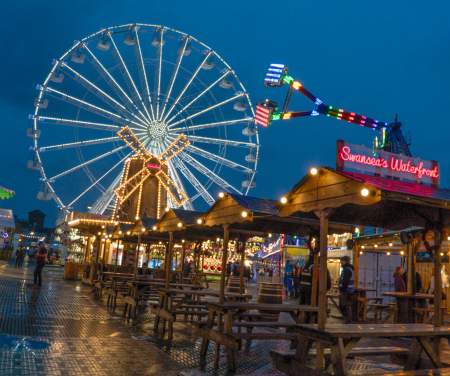 The big wheel lit up in the dark at Waterfront Winterland.