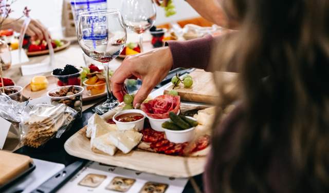Arranging a board at a Charcuterie Board Workshop