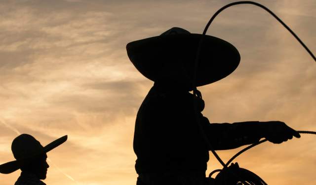 Silhouette of Rodeo Cowboys
