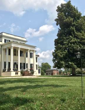 Greek Revival mansion at Oatlands Historic House and Gardens on a sunny day in Leesburg, Loudoun County, Virginia