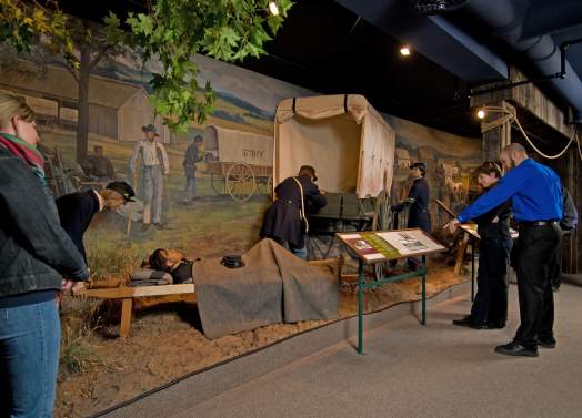 Group looking at an exhibit at the Museum of Civil War Medicine