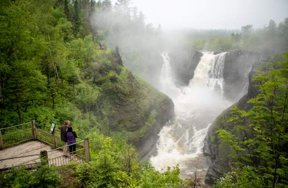 Grand Portage Waterfall with two people