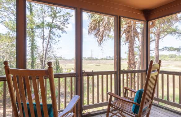 Cottage Porch View with Rocking Chairs