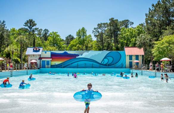 People in tubes in the Big Kahuna wave pool