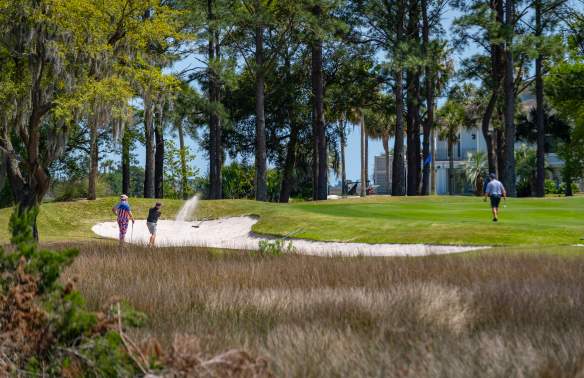 People Golfing