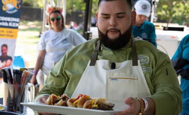 Chef Carlos with the Signature Pepper Steak Sandwiches