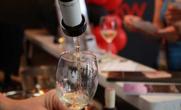 Enjoy white wine at the Heart of Gilroy Festival