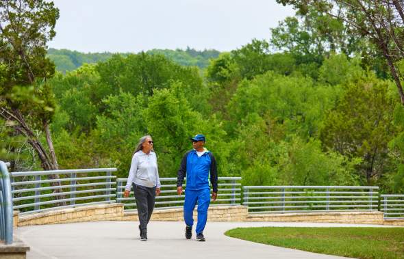 Senior Couple Walking Trail