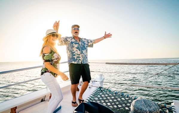 Couple laughing together on a sunset boat cruise on South Padre Island