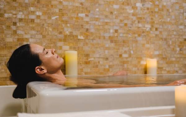 Women in spa bath relaxing