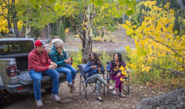Group of People Tailgating on the Grand Mesa during Fall