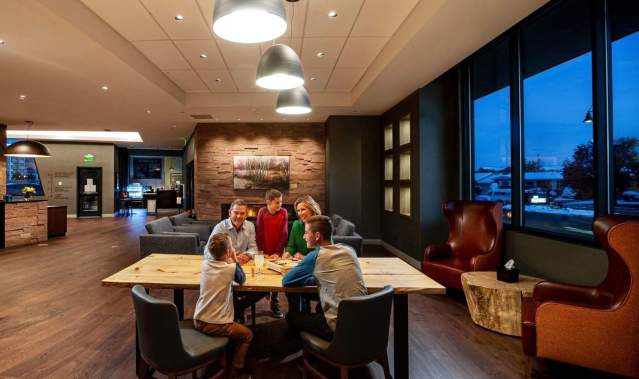 View of a family in Hotel Maverick's Lobby