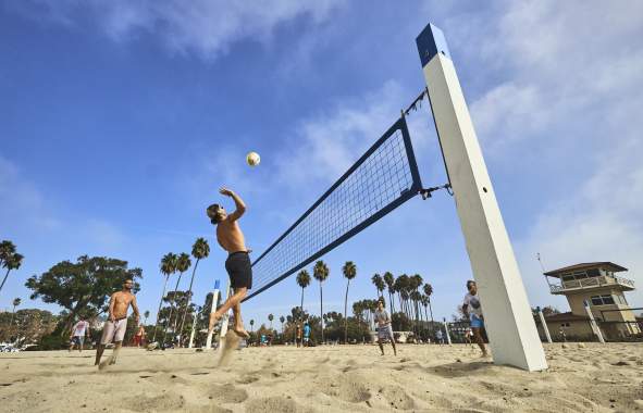 Vollyball players at Doheny State Beach in Orange county