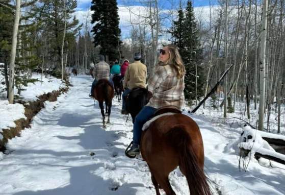 Snowy riding with Rocky Mountain Stables