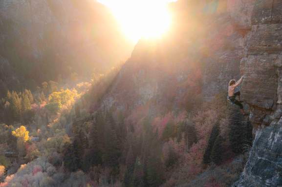 Man Rock Climbing American Fork Canyon during the fall time