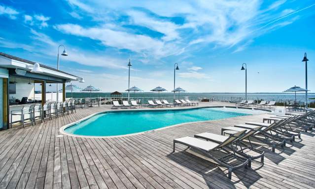 https://assets.simpleviewinc.com/simpleview/image/upload/c_fill,f_jpg,h_383,q_65,w_639/v1/crm/oceancitymd/Residence_Inn_Outdoor_Pool_55959584-5056-a36a-06dcc052a99e1d59.jpg