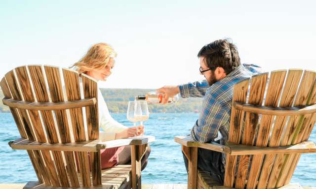 Couple on a Dock with Wine