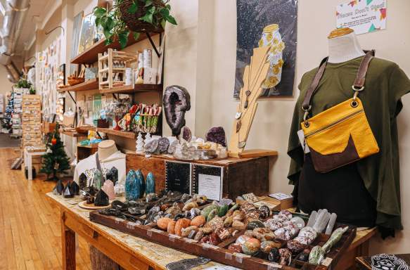 A display of clothing, gemstones, art, and more at Gather