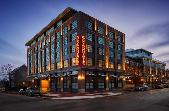 Outside of the Graduate Hotel at dusk