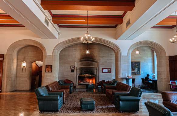 A view of the fireplace and leather seating in the Indiana Memorial Union's South Lounge