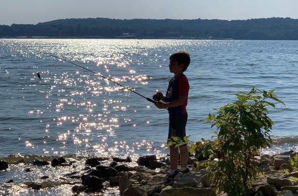 Little boy fishing at Hardin Ridge Recreation Area