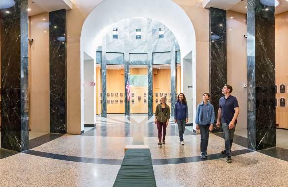 Family walking through the Plaque Gallery at the National Baseball Hall of Fame