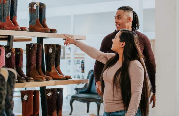 Couple shopping for cowboy boots at Beck Boots in Amarillo, Texas