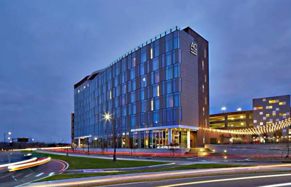 Exterior of the AC Marriott Dublin at night.