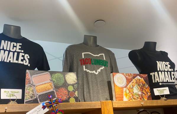 TShirt on a mannequin that reads "TaColumbus" in red and green letters from Dos Hermano's in North Market Bridge Park