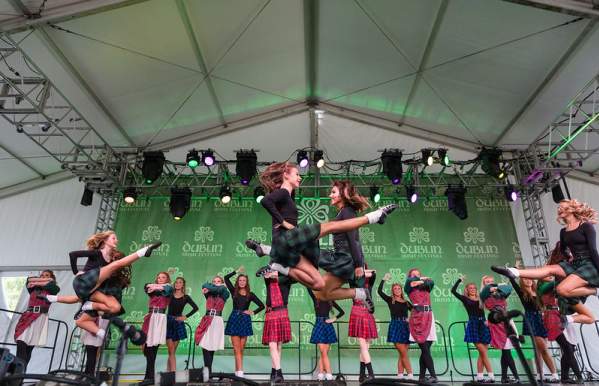 Irish Dancers mid-air performing at the Dublin Irish Festival