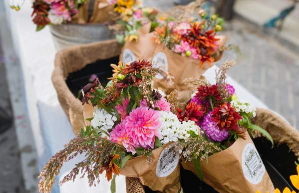 Colorful flower arrangements for sale on table at the Dublin Market