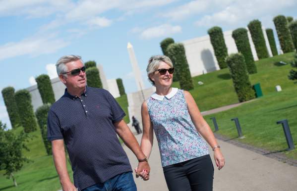National Memorial Arboretum History Heritage couple walking in front of Armed Forces Memorial