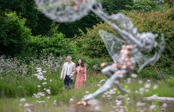 couple walking with the fairies
