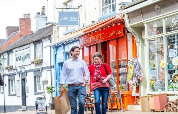couple in Leek town centre with shopping bag