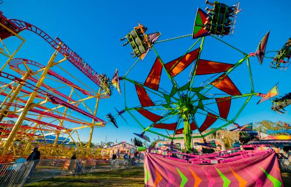 A view of brightly colored fair rides