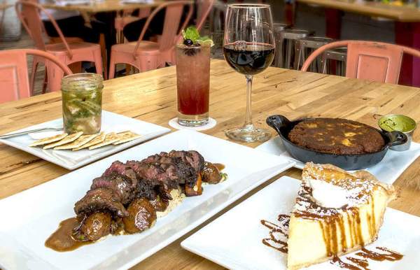 a table set with food at a restaurant in mobile al