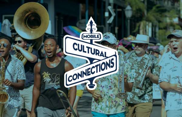 Brass band playing horns and singing; Mobile Cultural Connections