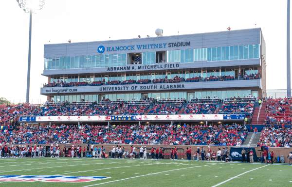 Football field with fans in the stands