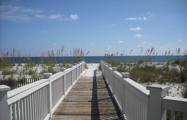 wooden walkway leading to the beach