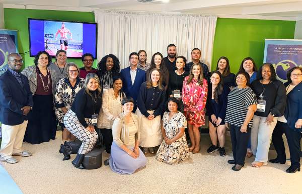 A group of people pose together for a photo